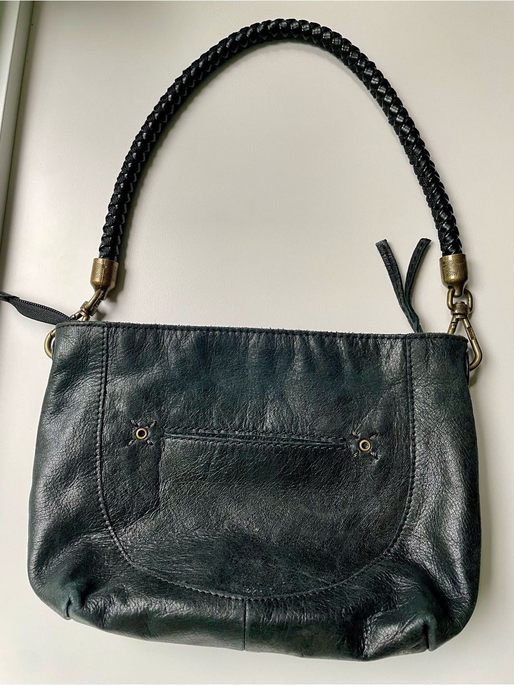 The Sak Black Leather Shoulder Bag Braided Strap Bronze Hardware Pockets Lining